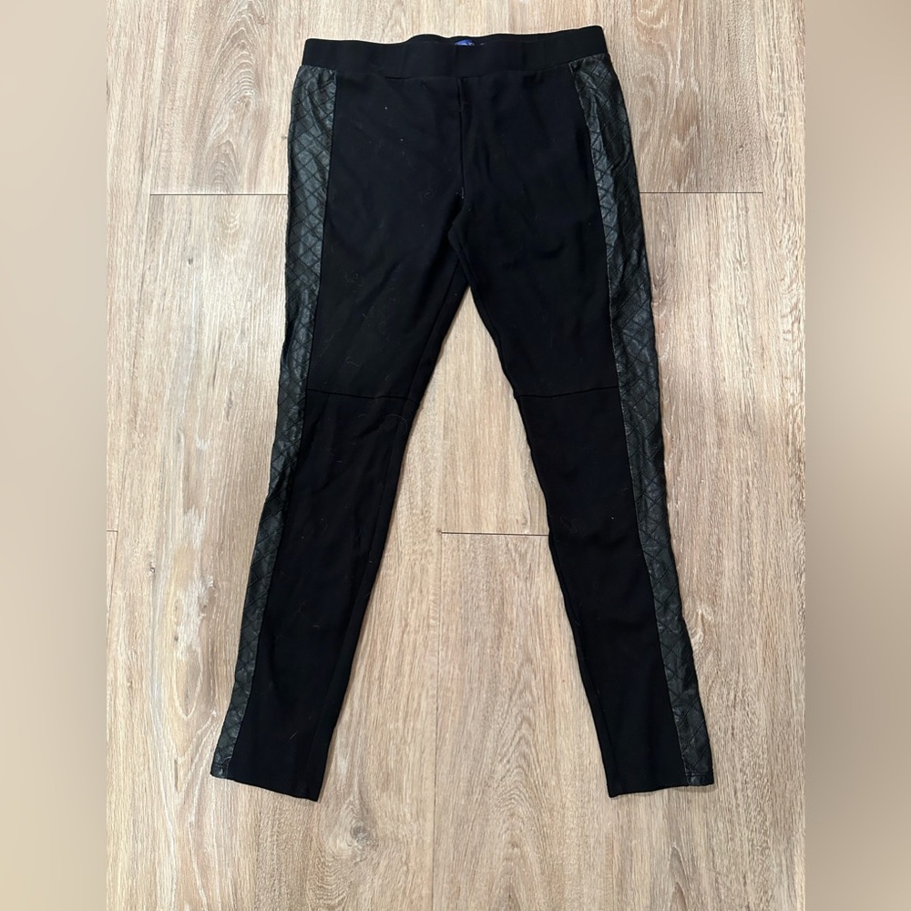 Womens size medium Saphire ink leather strip pants never worn